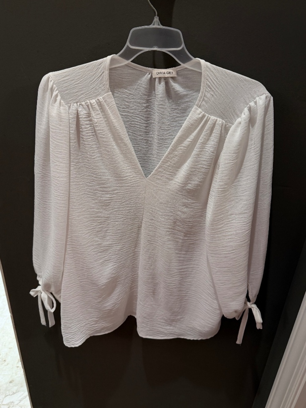 White crepe 3/4 length sleeve blouse. Size 1X